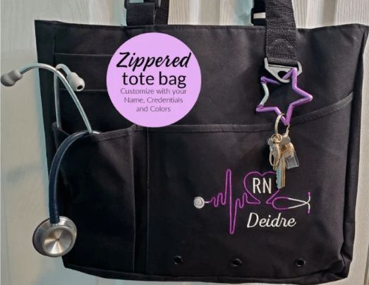 Black nursing bag with exterior compartments.