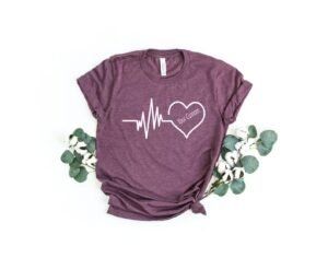 Maroon unit shirt with custom name.